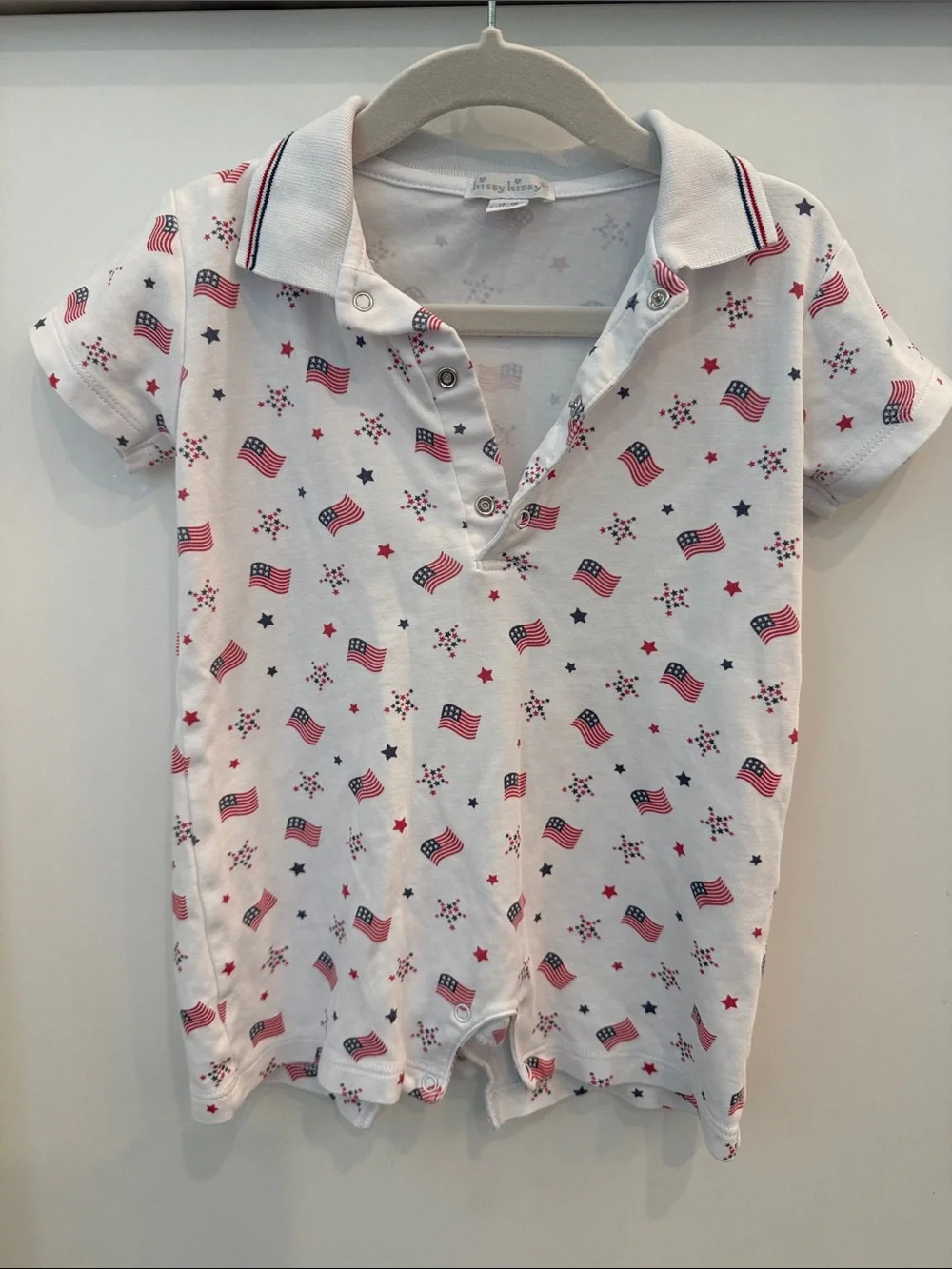Kissy Kissy White Polo Romper with Red & Blue Flag Print